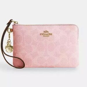 Powder pink Coach wristlet wallet